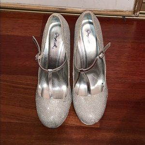 Silver, glitter platform heels.